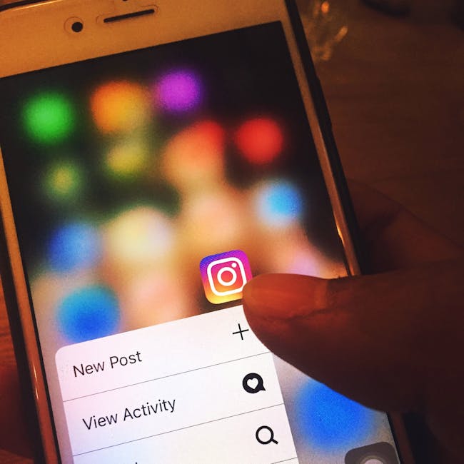Finger navigating Instagram app on a smartphone screen with colorful blurred background.